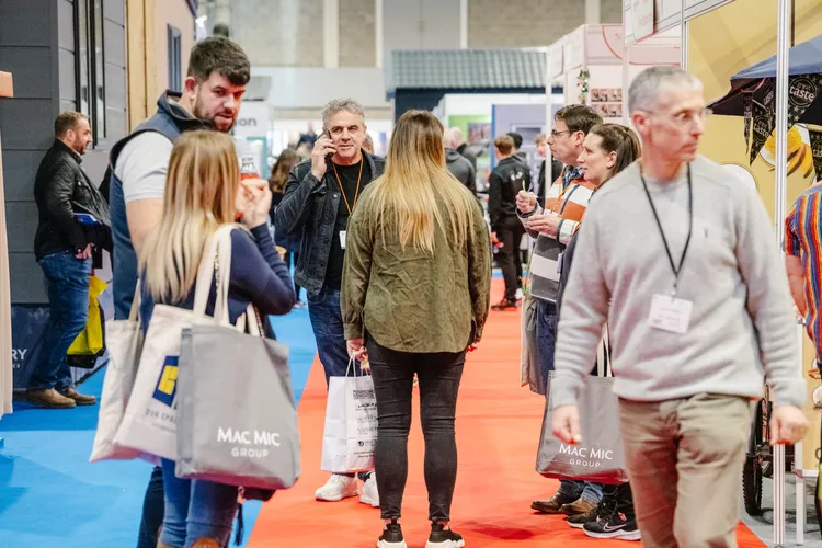 Attendees at exhibits during the show